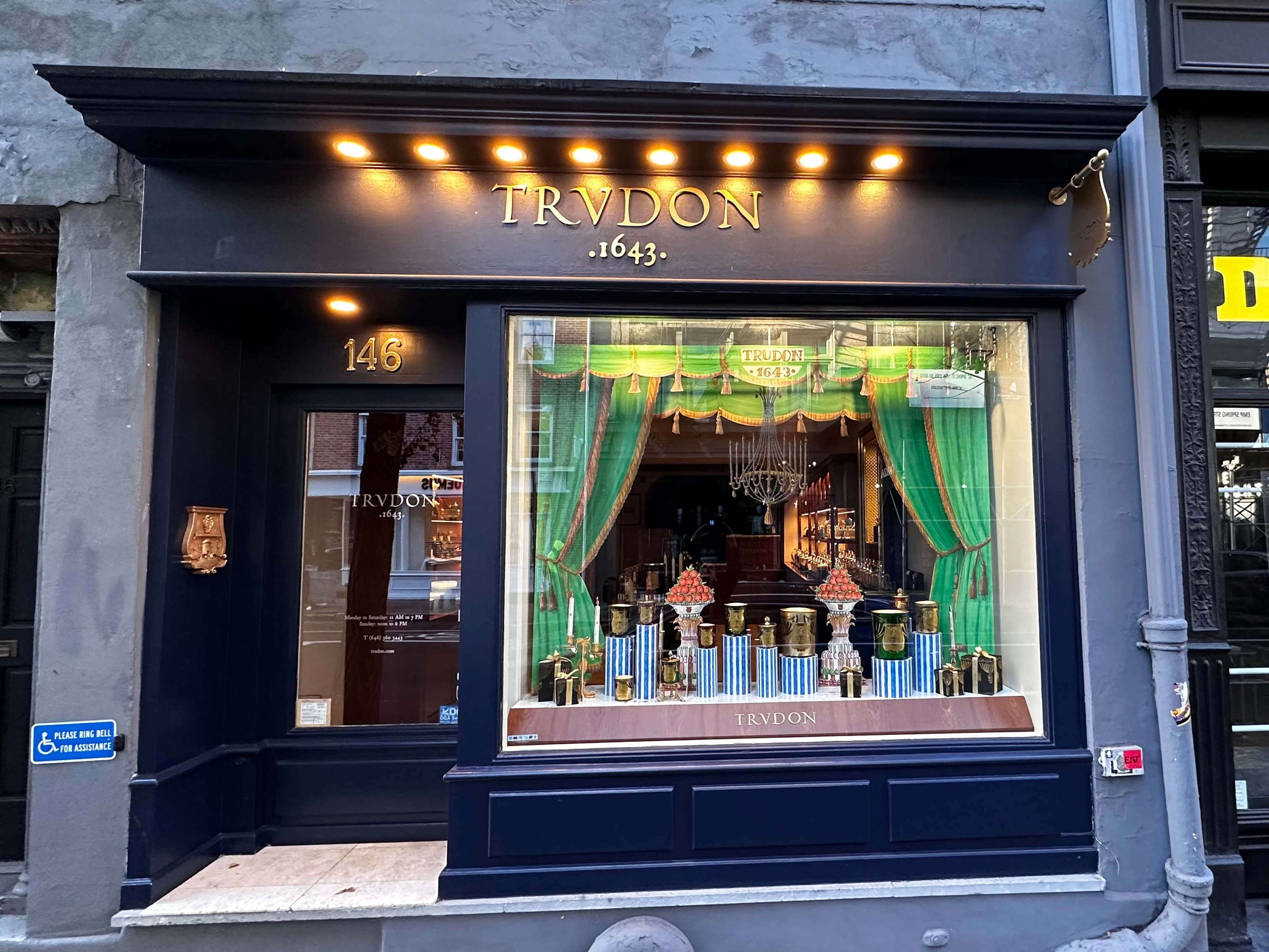 Trudon storefront with ornate candle display