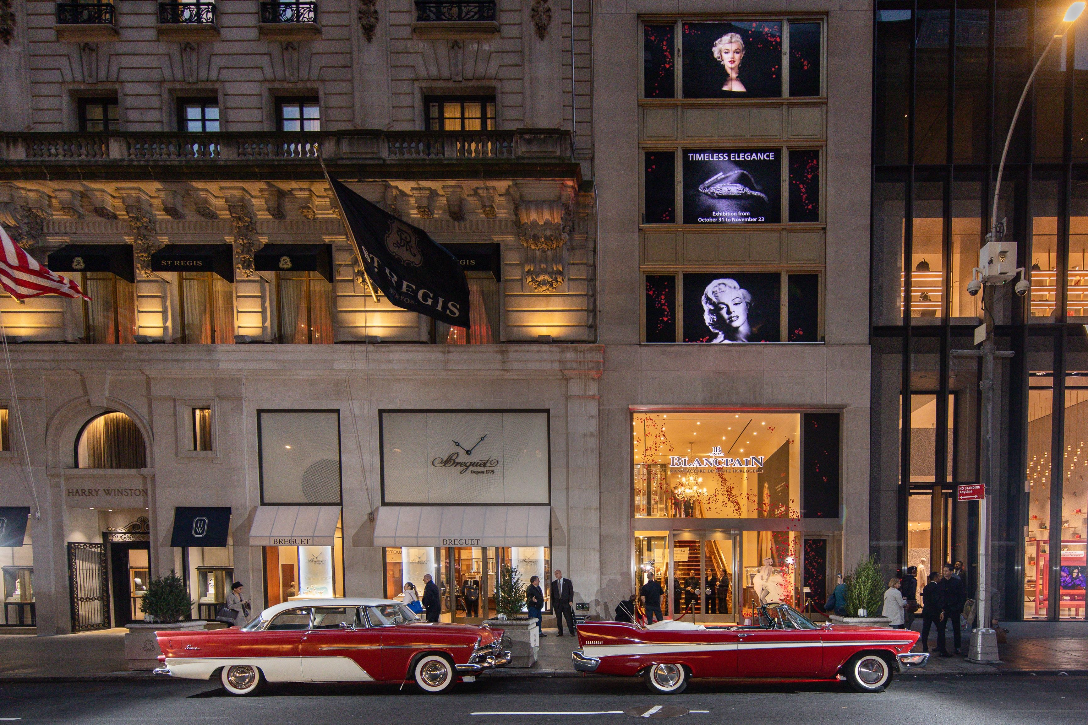 Vintage cars outside luxury jewelry stores