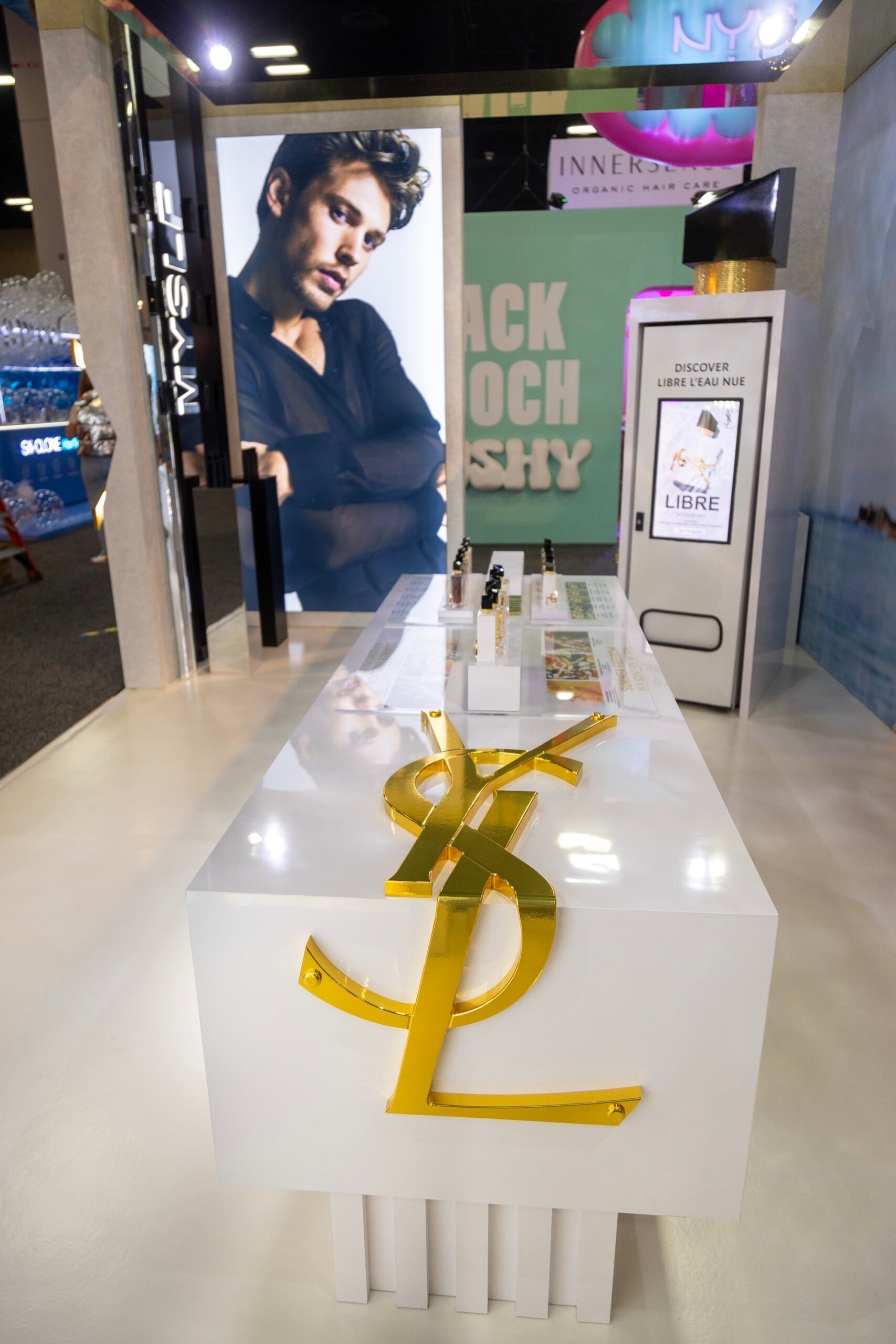 YSL fragrance display with perfume bottles