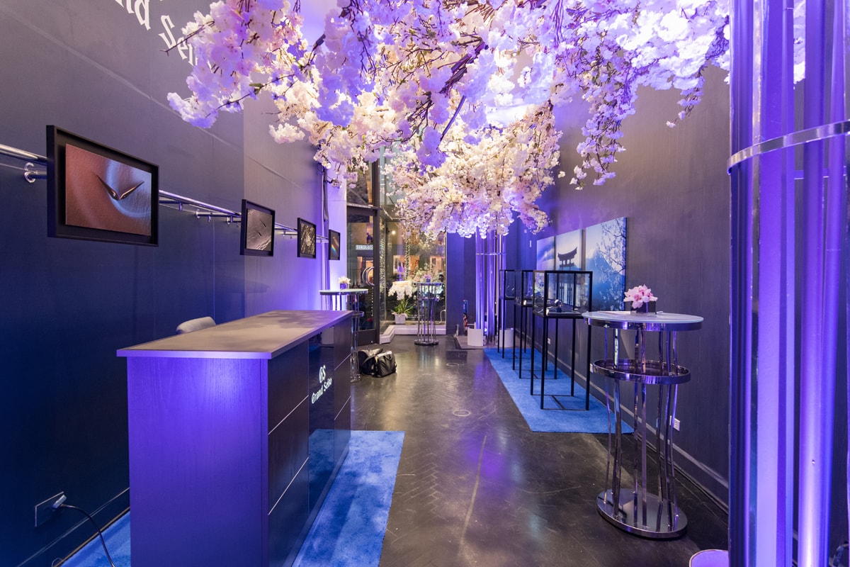 Grand Seiko boutique event with purple floral decor