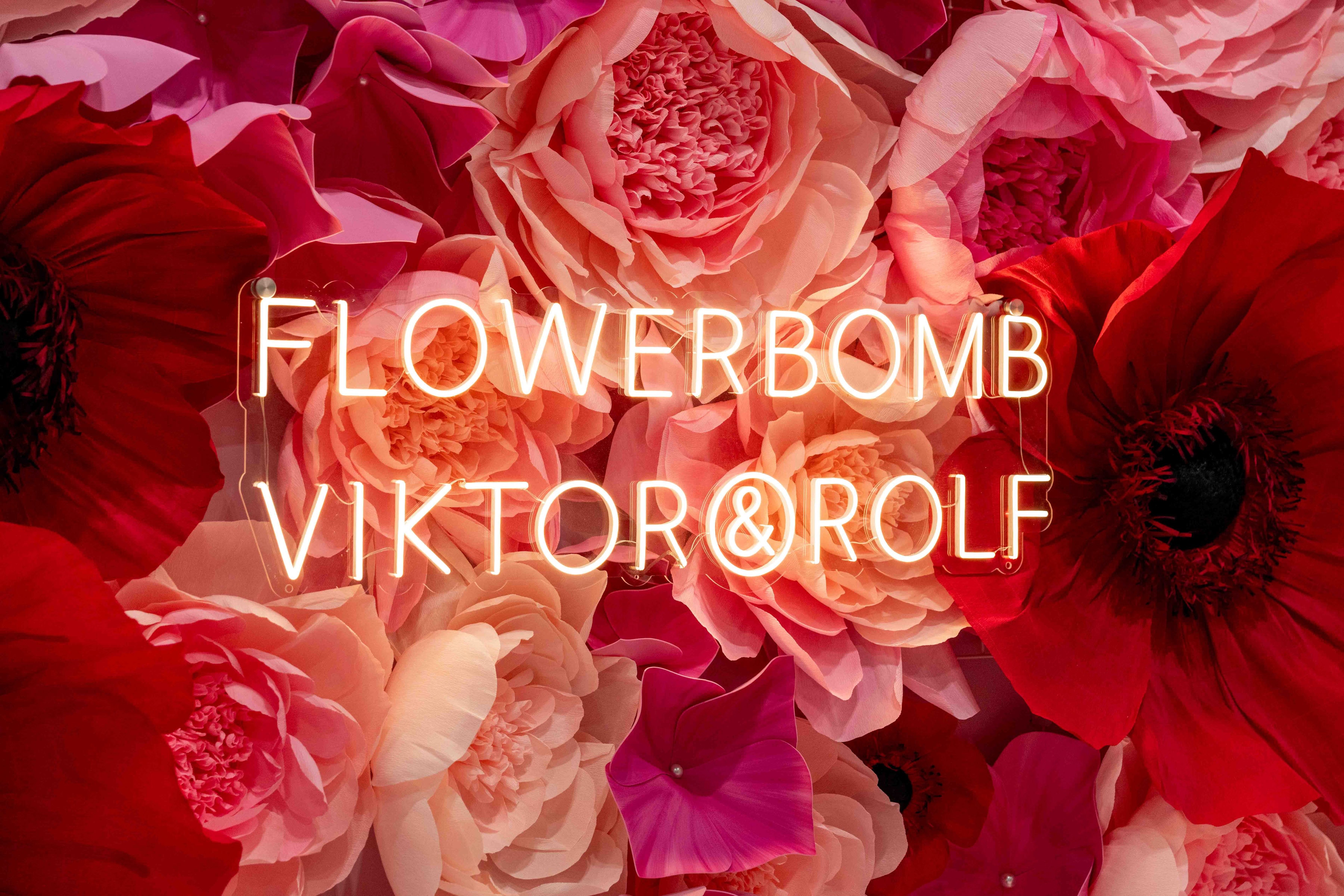 Flowerbomb Viktor & Rolf neon sign floral backdrop