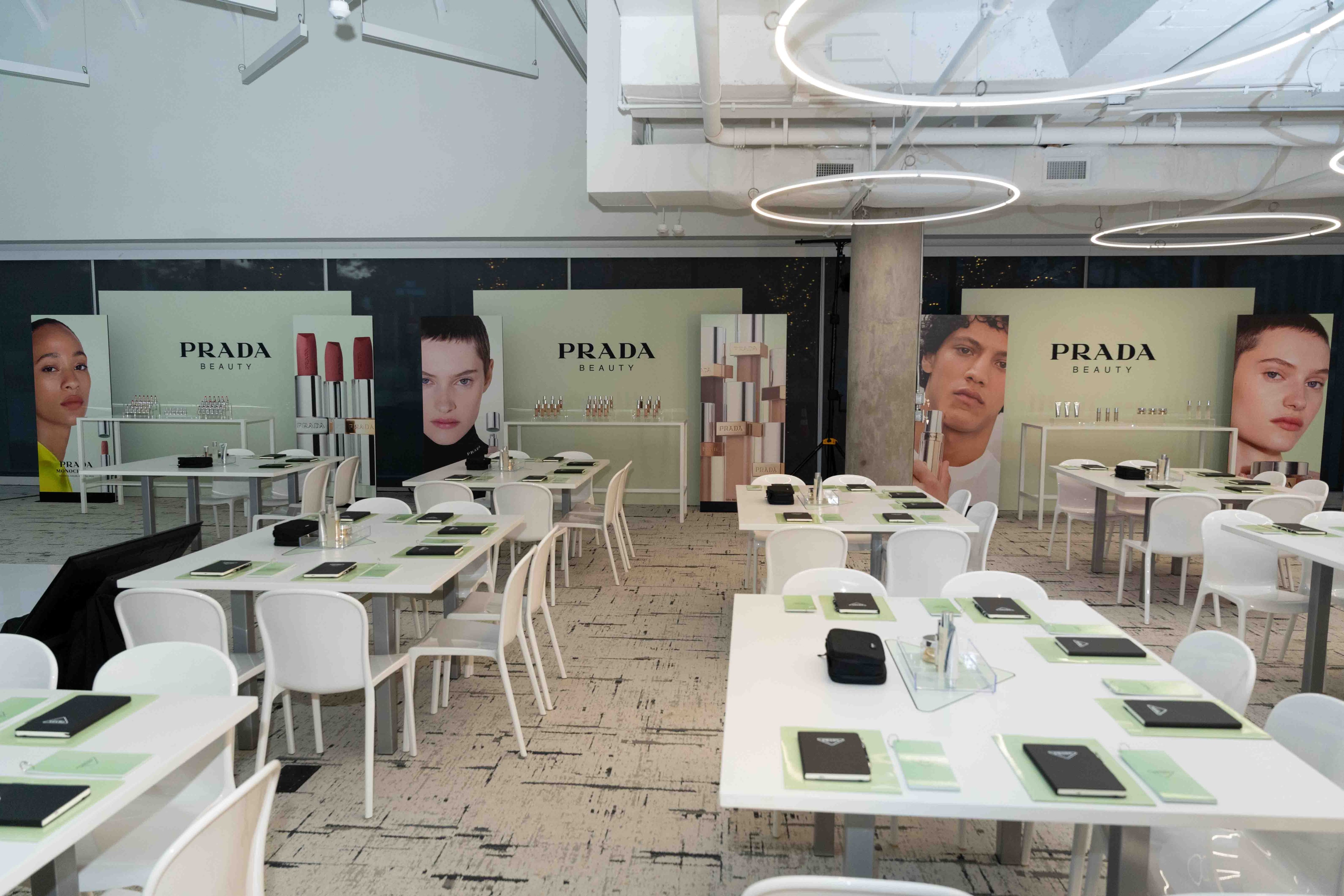 Prada beauty training event with cosmetics tables