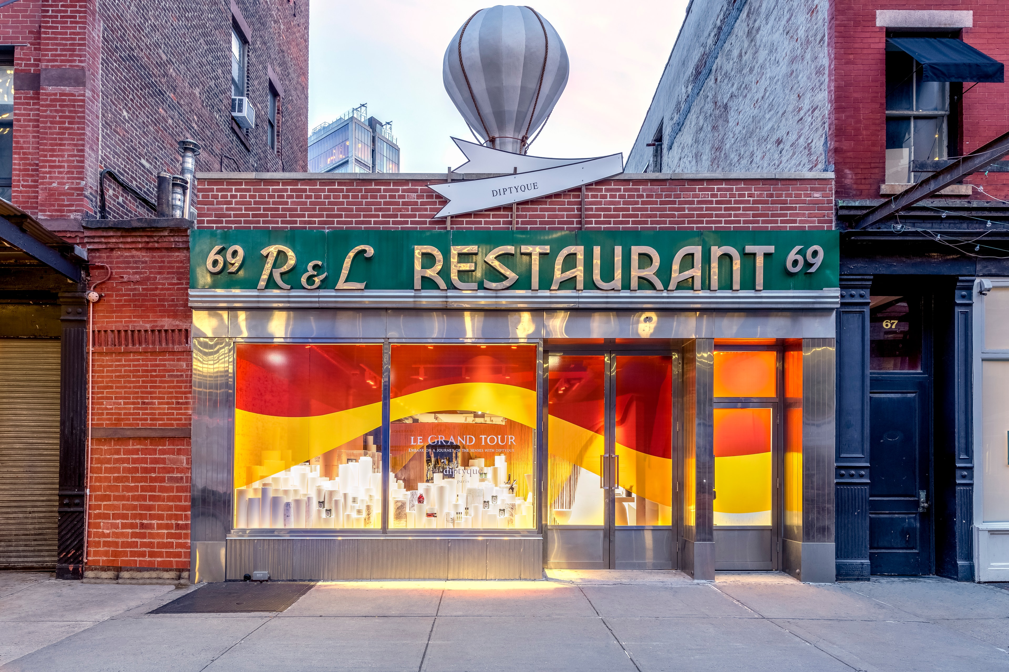 R&L restaurant storefront with balloon sign